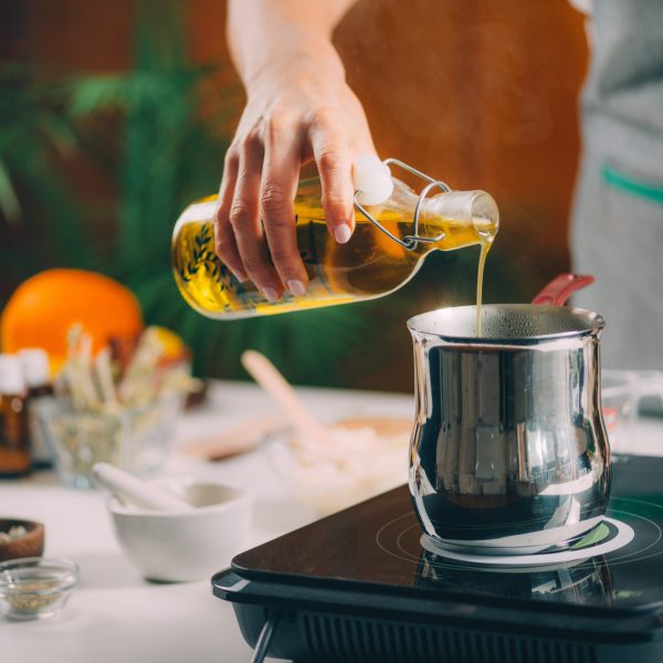 Pouring Natural Oil, Making Homemade Soap.
